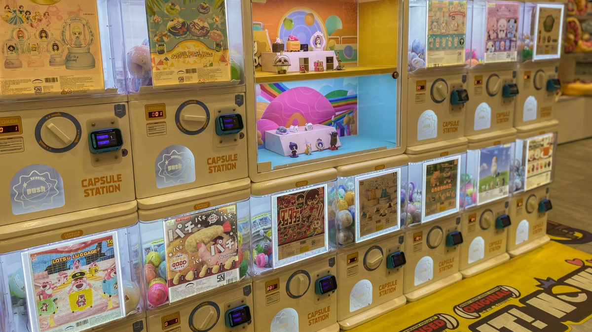 Capsule toy machines with collectible prizes on display