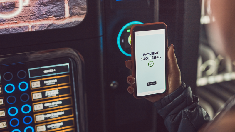 Custom vending machine with mobile payment confirmation