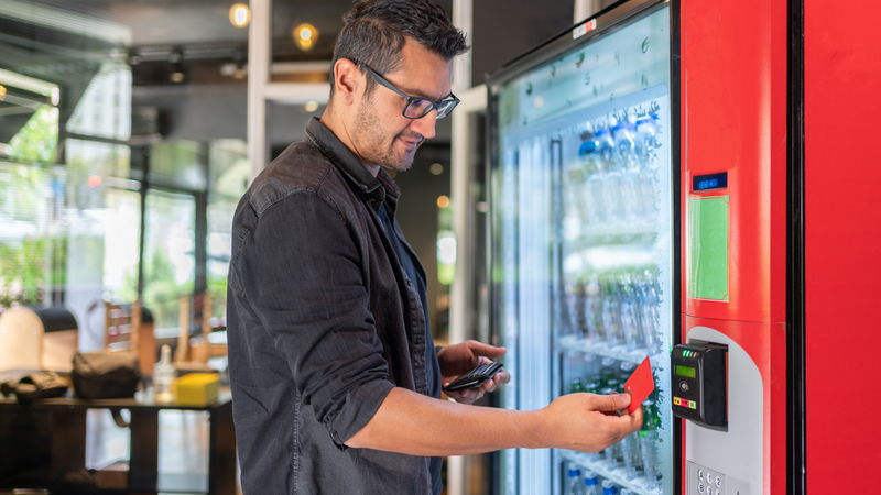 Vending machine customer making a cashless payment
